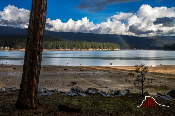 Rainbow over Bass Lake, California